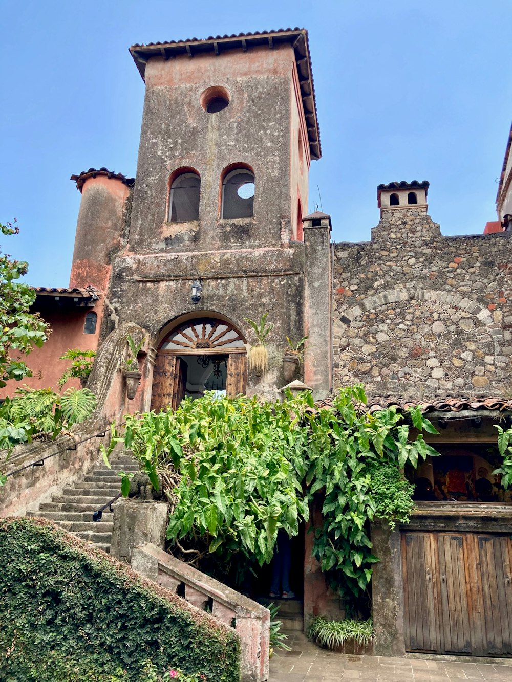 an old building with a clock tower on top of it