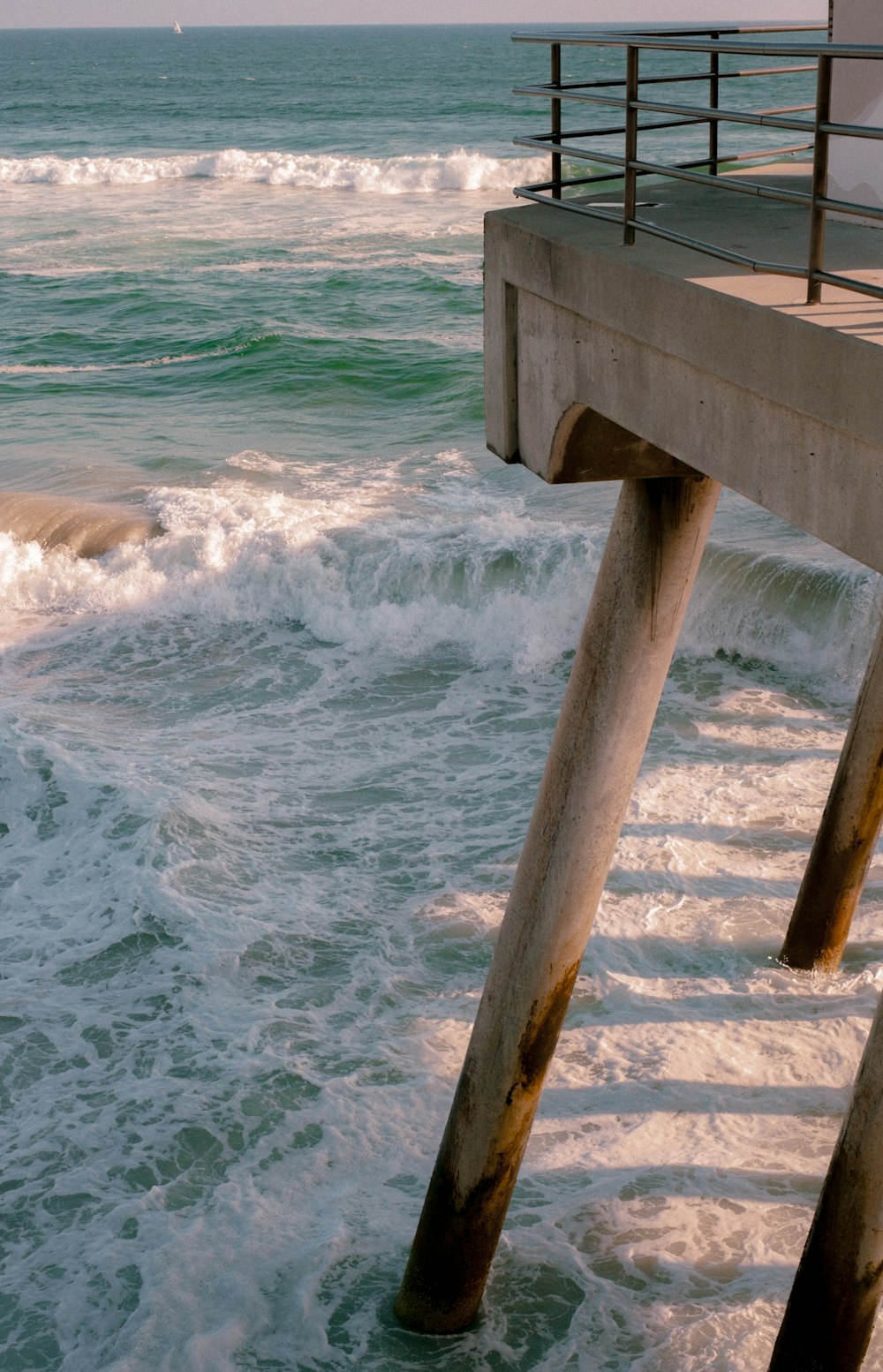 a view of the ocean from a pier