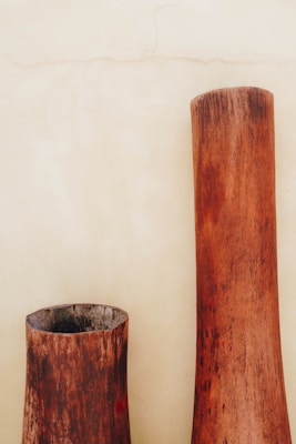 A beautifully crafted wooden vase showcasing natural grain.