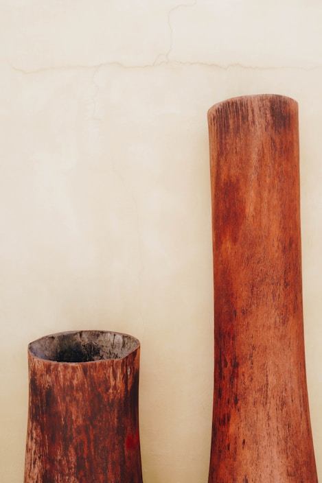 A beautifully crafted wooden vase showcasing natural grain.