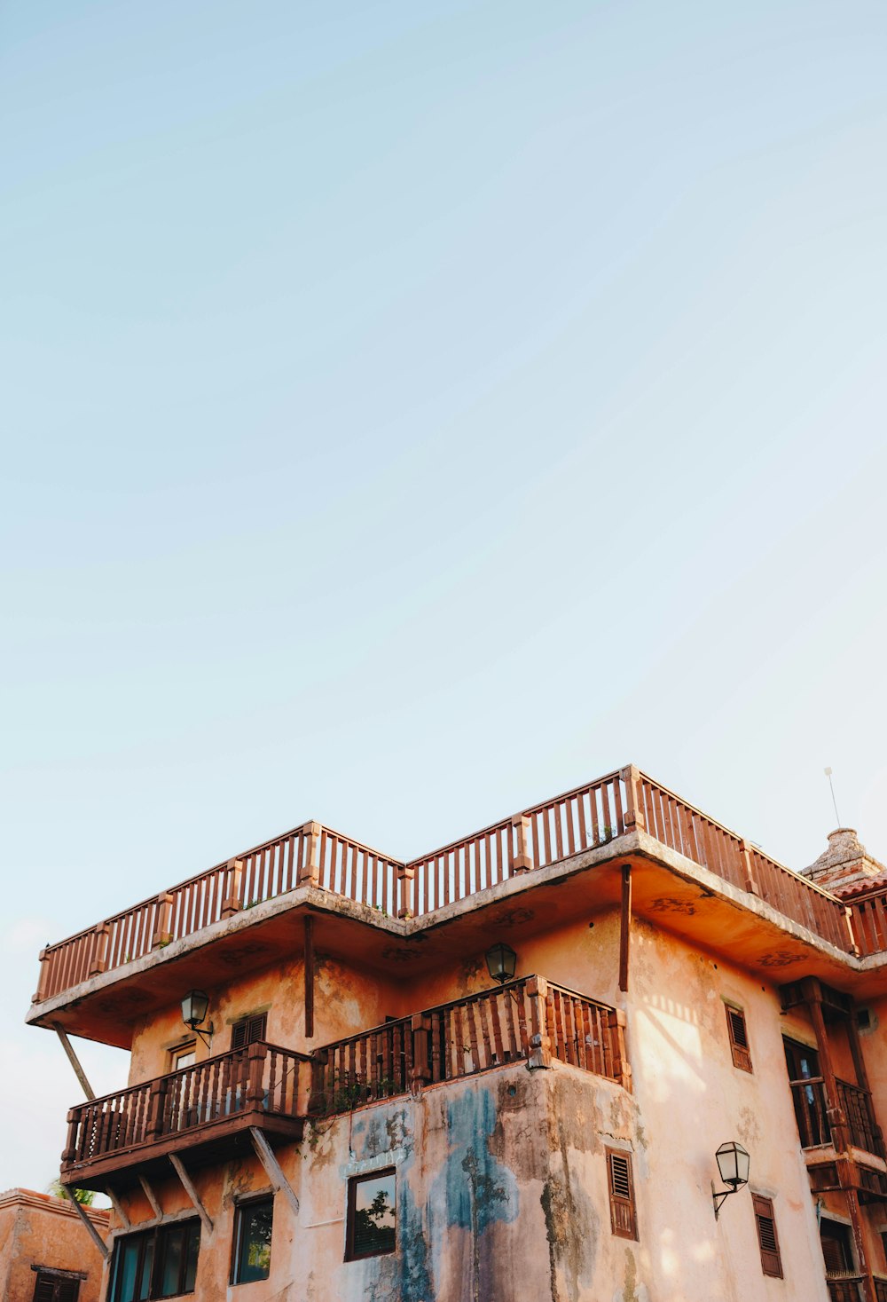 an old building with a balcony and balconies