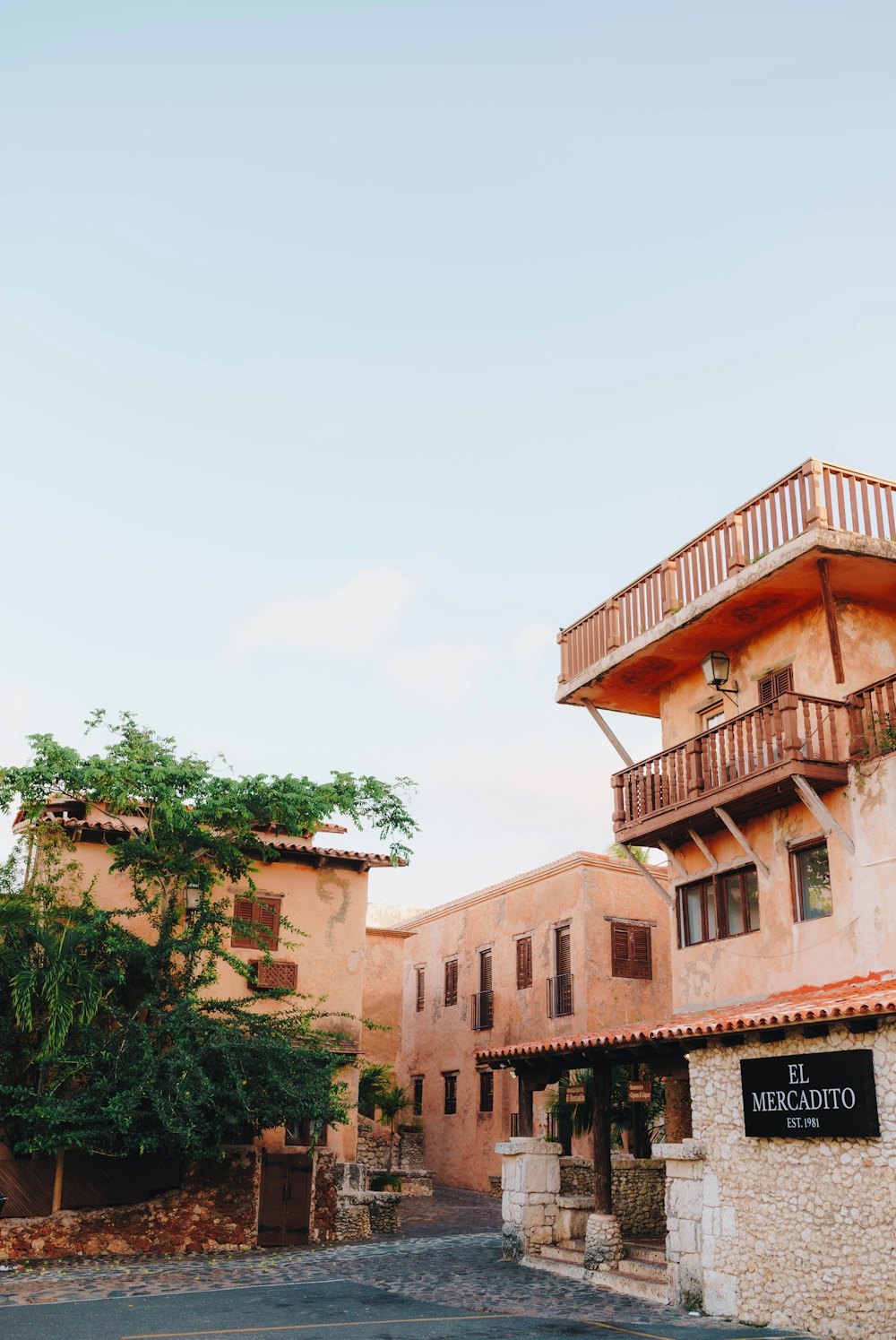 a building with a balcony and balconies on top of it