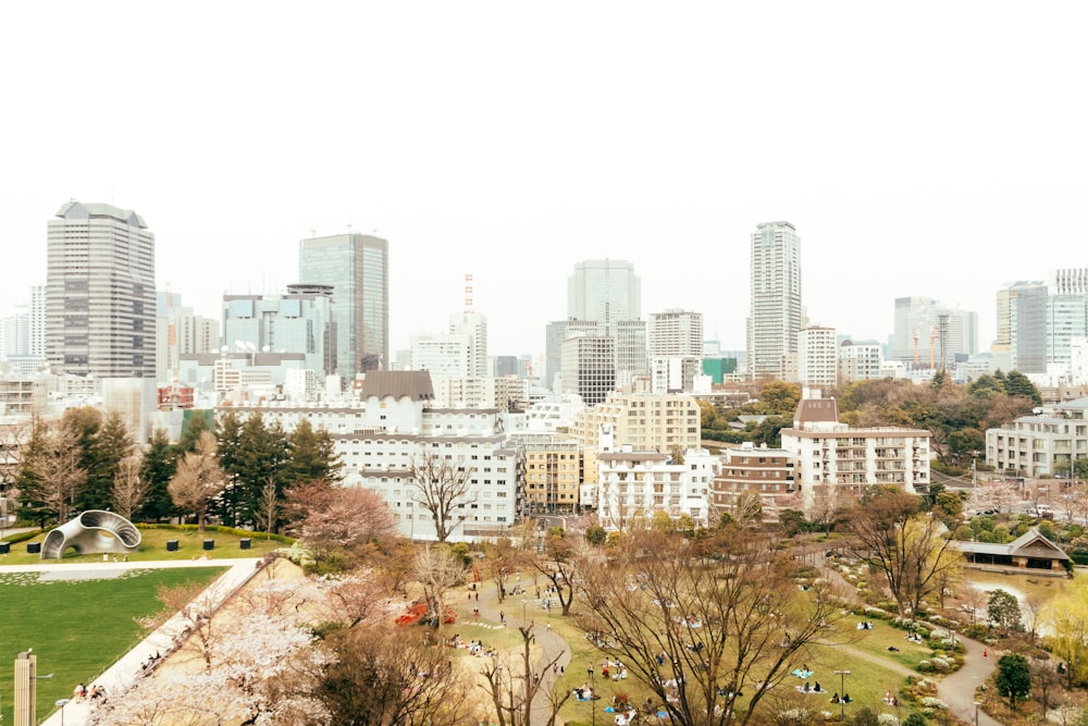 a view of a city with tall buildings