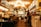 Interior of a cozy restaurant with customers enjoying meals and friendly service.