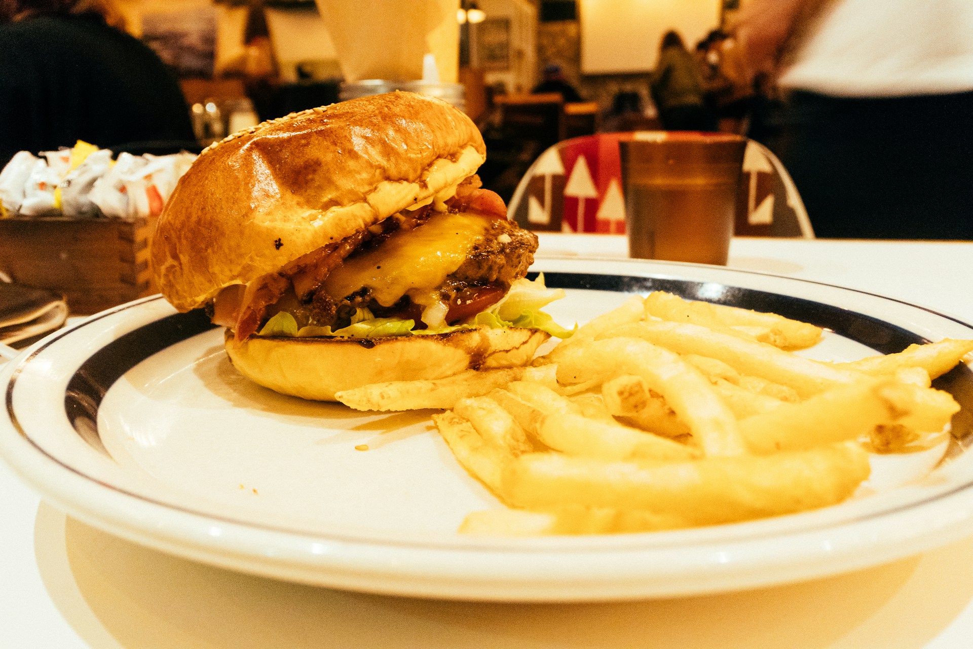a hamburger and french fries on a plate