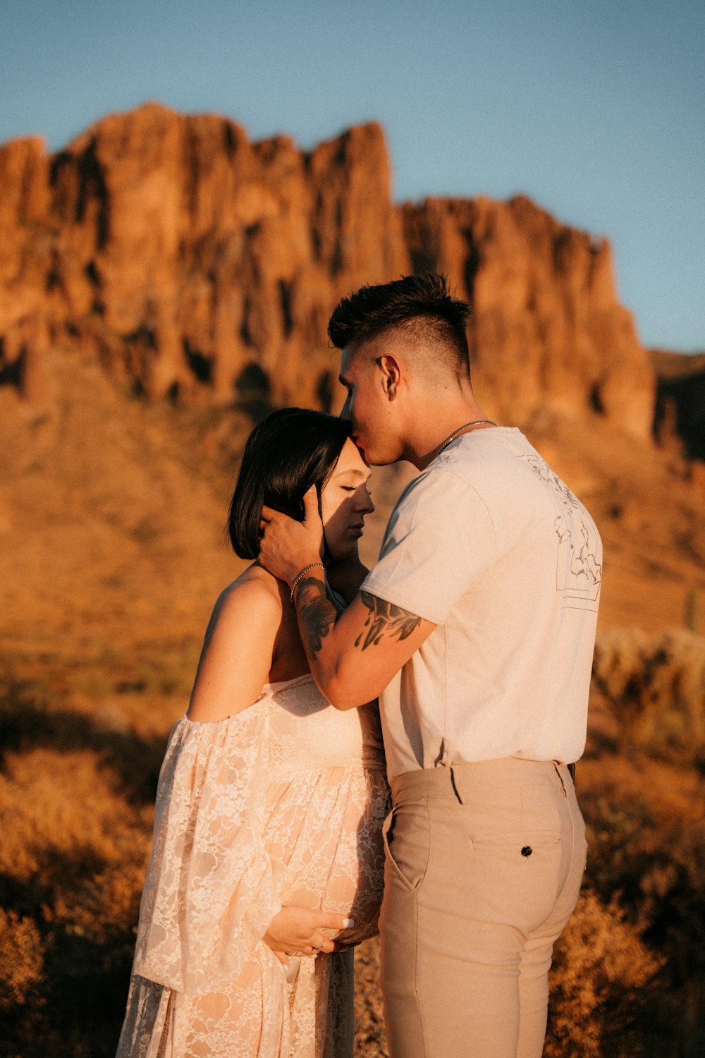 a man and a woman standing next to each other