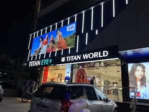 Time World storefront showcasing the brand logo alongside Titan and Fastrack partner signs