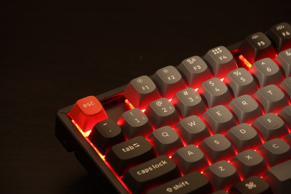 a close up of a red and black keyboard