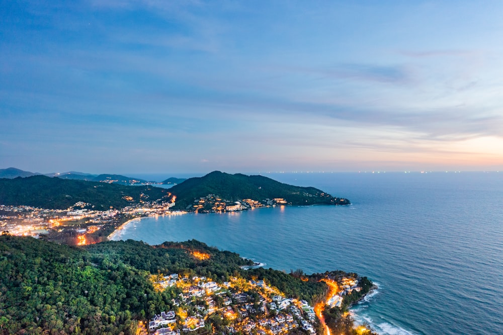 an aerial view of a city by the ocean