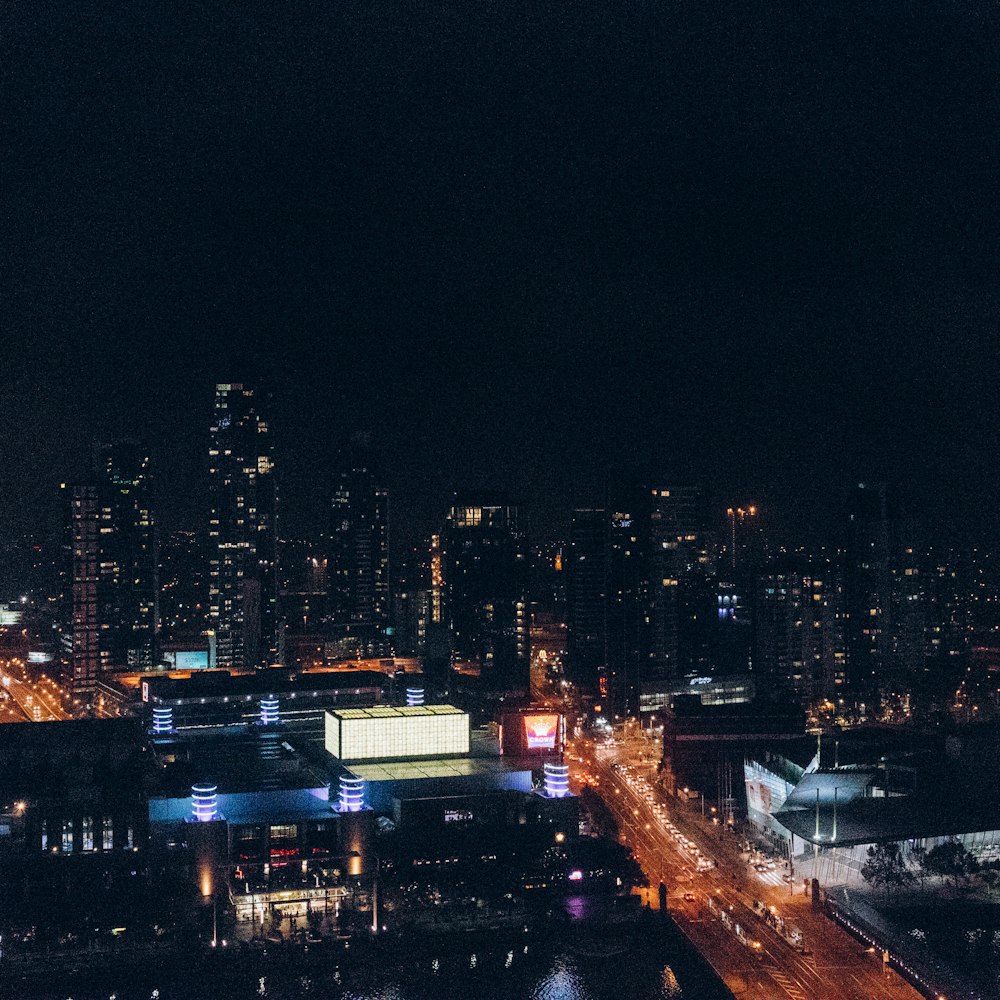 a view of a city at night from a tall building