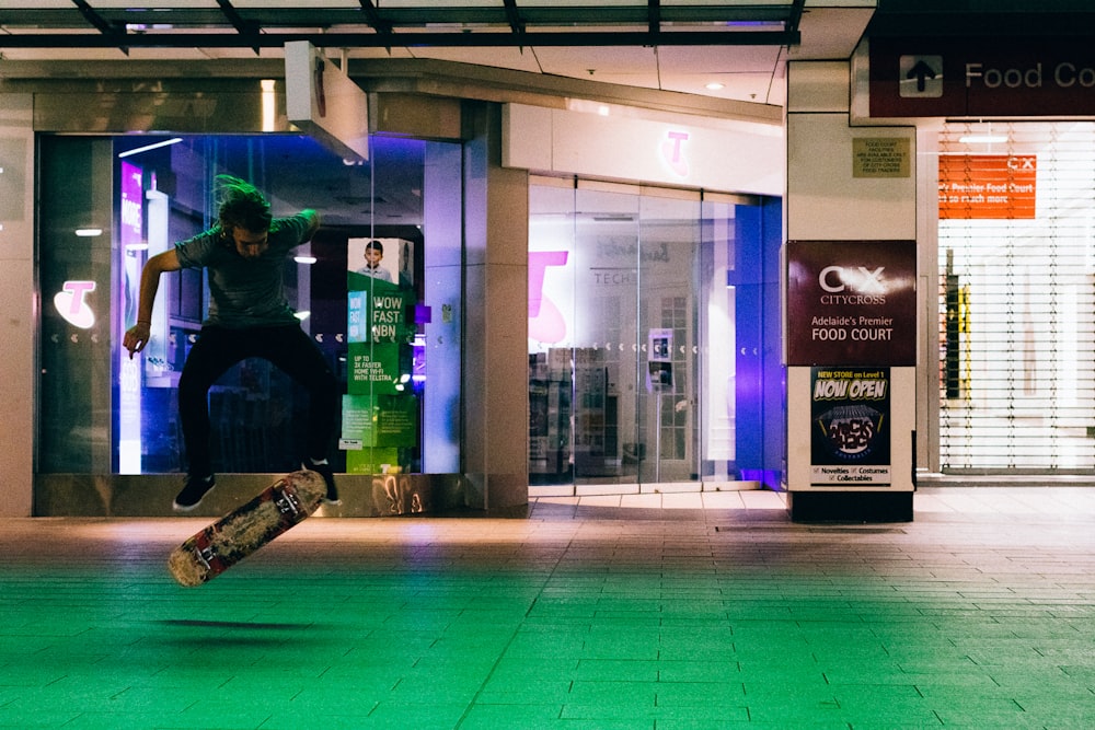 a person jumping a skate board in the air