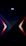 A dark, high-tech speaker with a futuristic design, featuring a prominent X pattern with red and orange lighting accents. Above the X pattern, a digital display shows the letters 'AU' in bright blue.