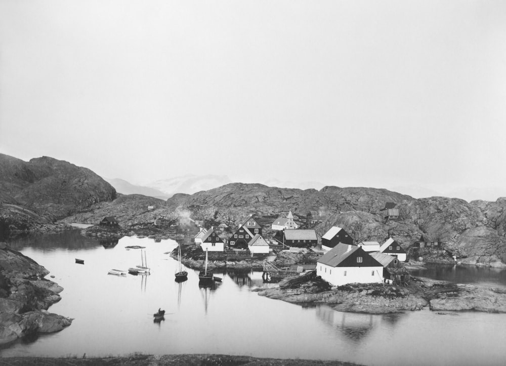 a black and white photo of a small village