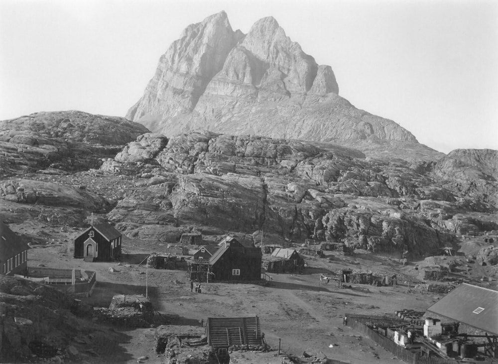 an old black and white photo of a mountain