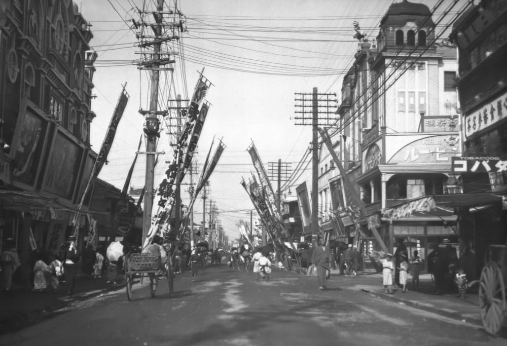 an old black and white photo of a city street