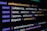 Computer screen displaying lines of JavaScript code. Variables and methods appear, with syntax highlighting in different colors such as purple, yellow, blue, and white against a black background.