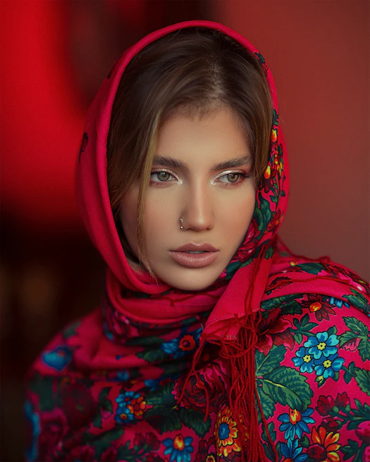 Close-up of a vibrant Golden Cotton scarf wrapped stylishly around a happy shopper