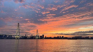A vibrant scene of floating islands connected by wooden bridges under a sunset sky.
