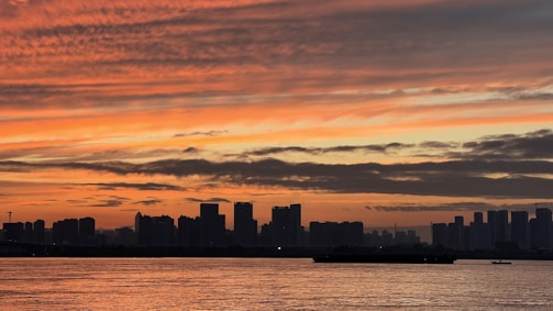 A panoramic view of a city skyline at sunset, symbolizing national coverage.