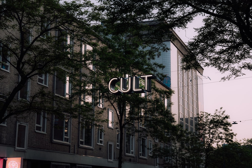 a building with a sign that says cut above it