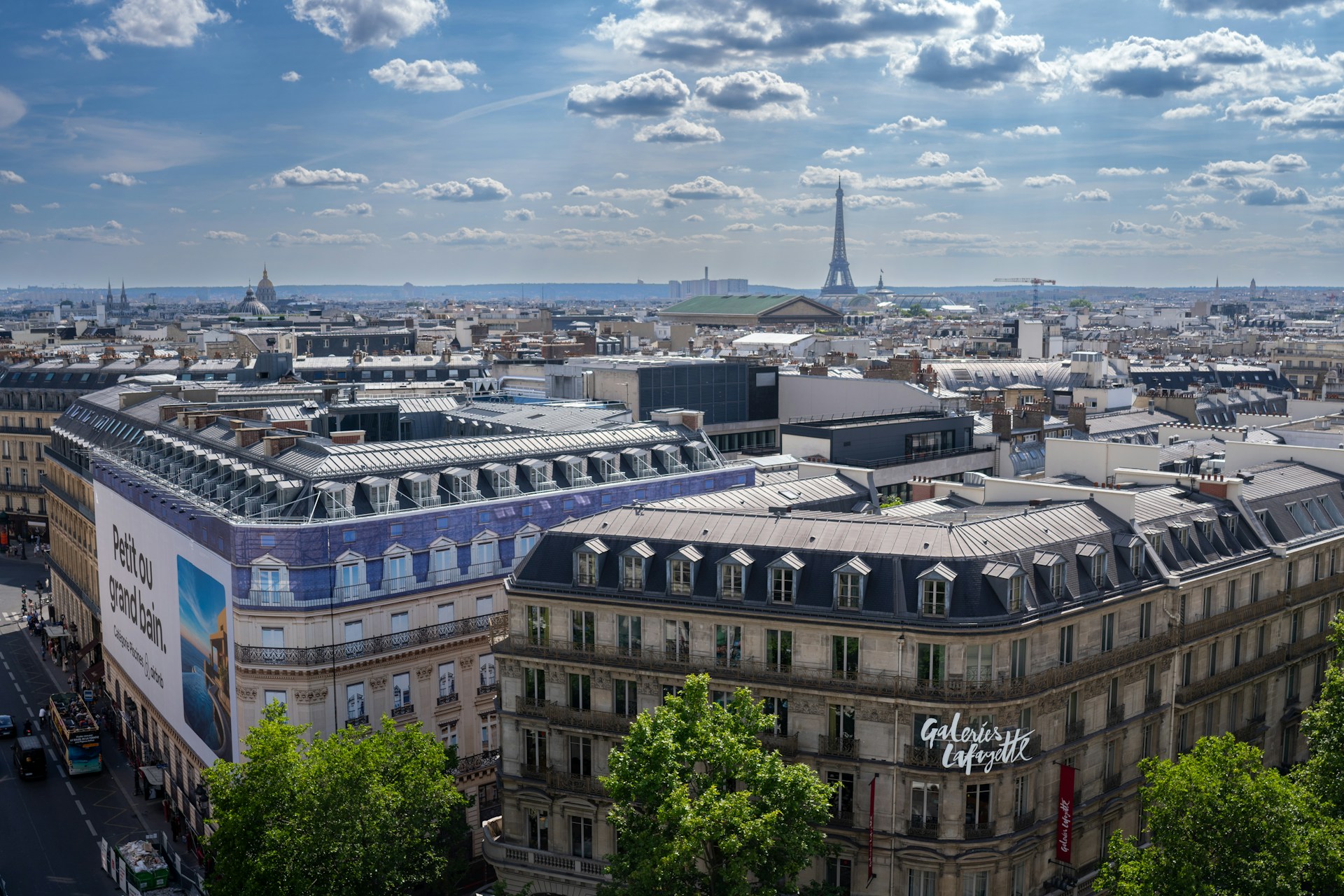 woman wearing yellow long-sleeved dress under white clouds and blue sky during daytime