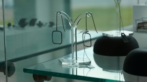 A collection of modern square glasses displayed elegantly.