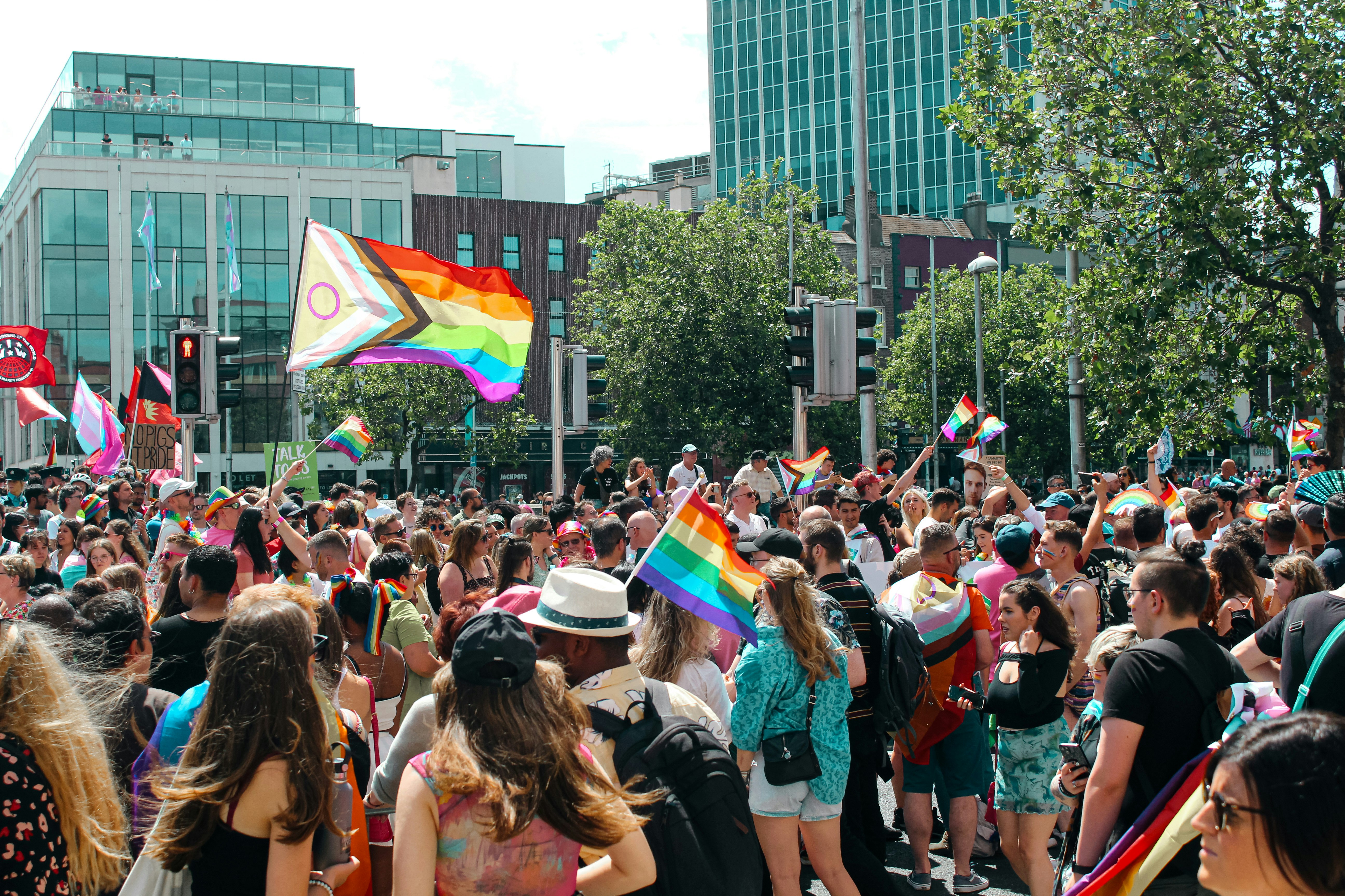 a large group of people walking down a street