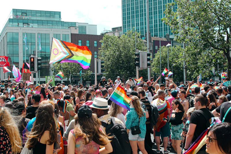 large Pride crowd walking through the street