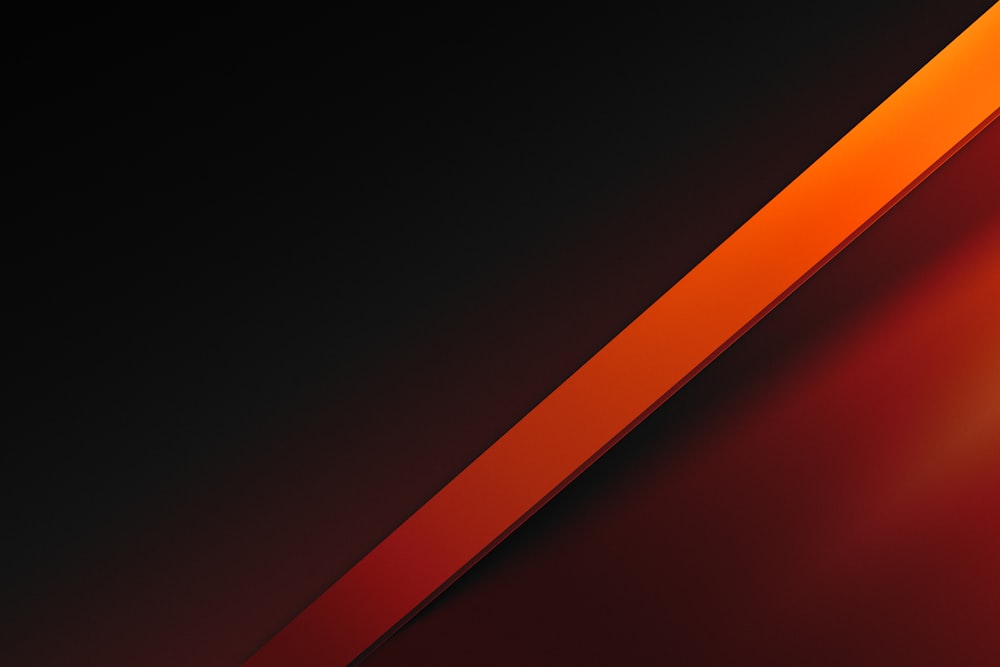 a red and black background with a diagonal stripe