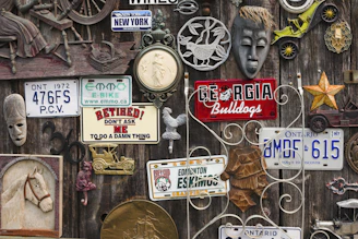 A colorful collage showing hunting equipment, fishing rods, antique collectibles, and sports cards.