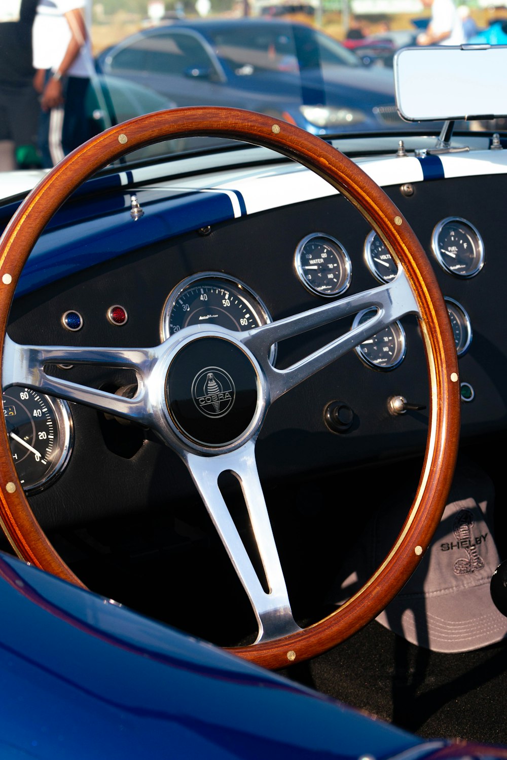 a close up of a steering wheel and dashboard of a car