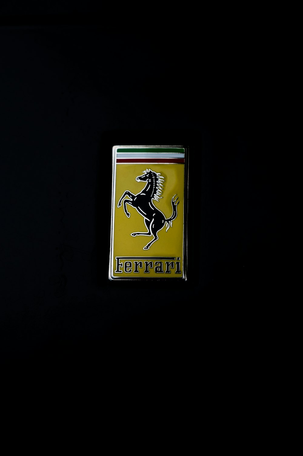a ferrari emblem on a black background