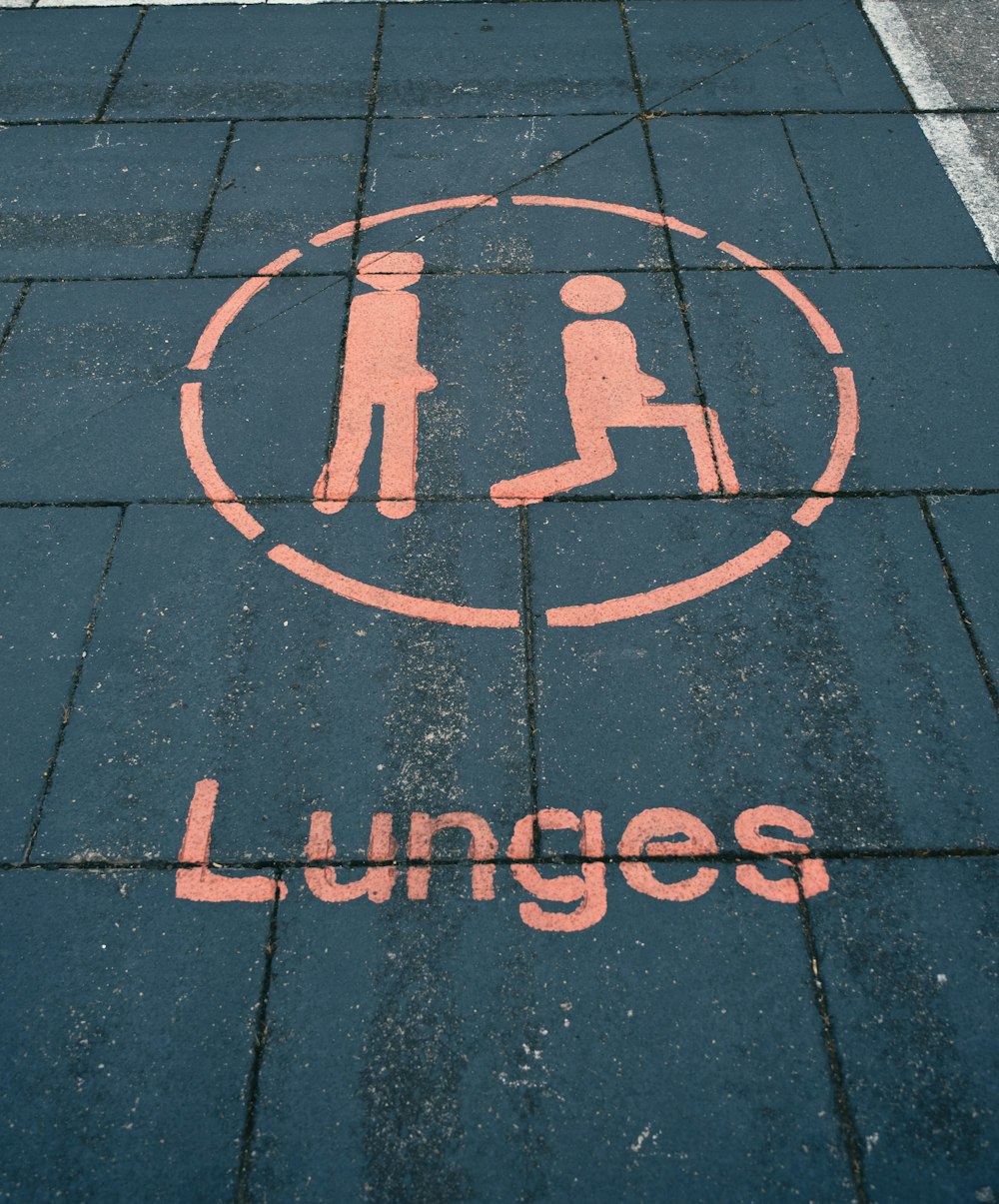 a sign on a sidewalk that says lungs