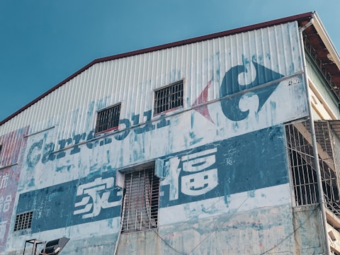 Industrial site with durable pylon signage standing strong against weather.