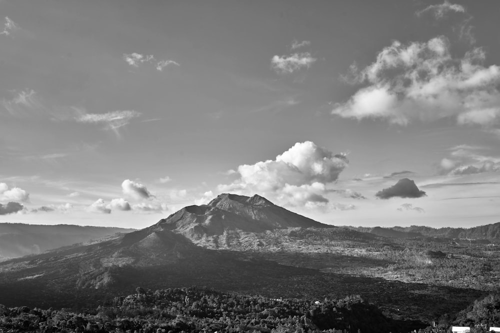 a black and white photo of a mountain