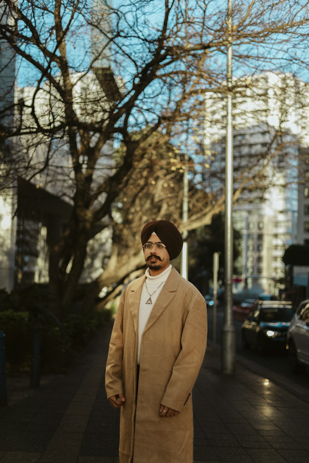 a man standing on the side of a street