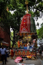 a man laying on the ground in front of a float