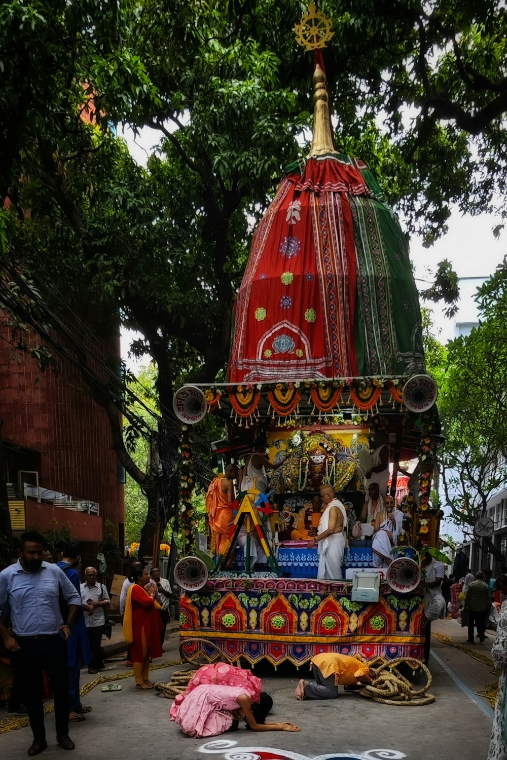 a man laying on the ground in front of a float