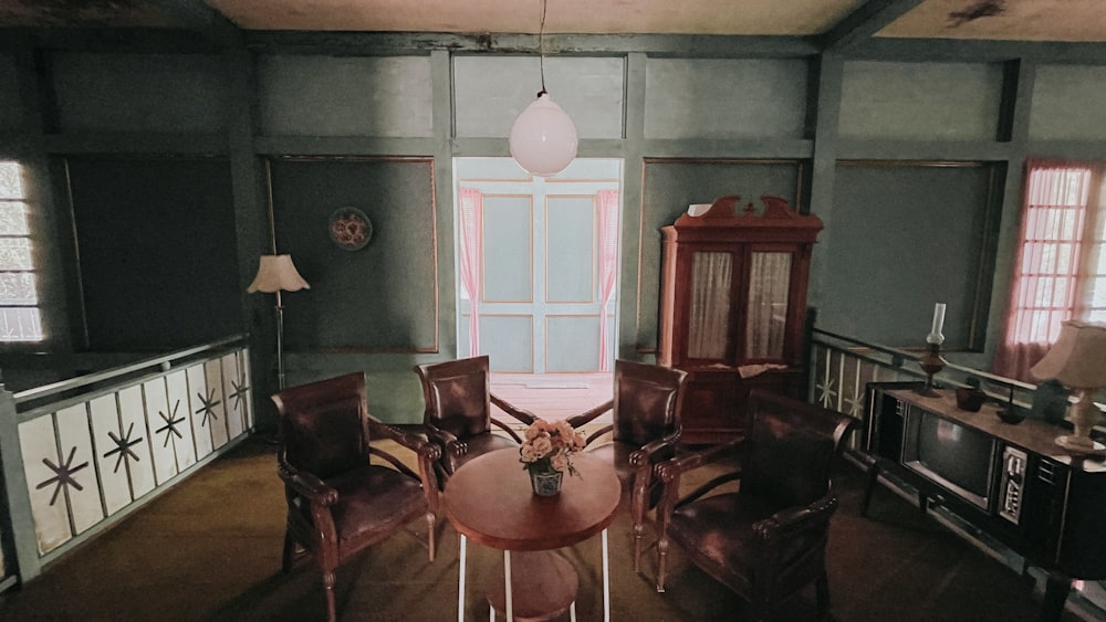 a living room filled with furniture and a table