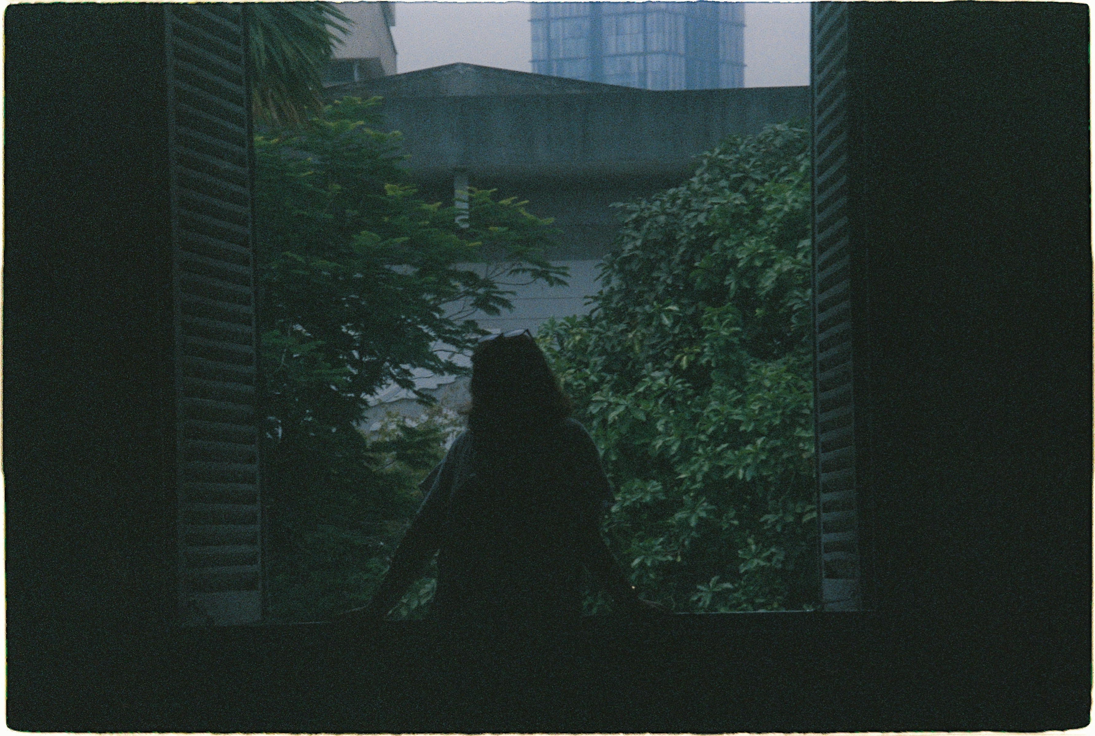a person standing in front of a window