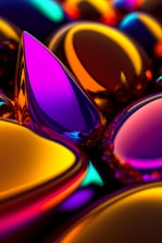 A collection of abstract, smooth, and glossy liquid-like droplets in vibrant colors such as yellow, purple, orange, and teal. The droplets exhibit a reflective surface, creating an illusion of depth and dimension.