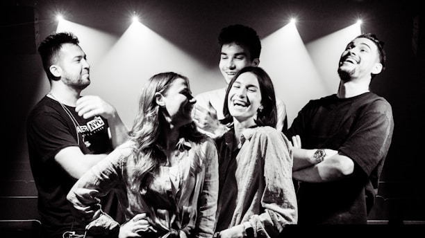 A group of happy customers sharing their positive experiences with Shitramax.