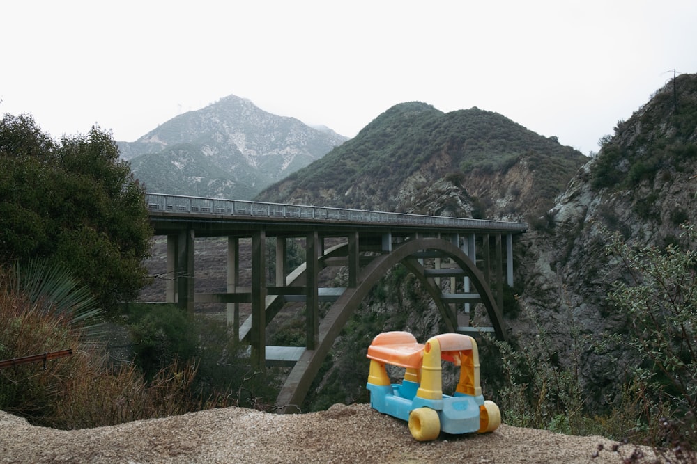 a toy sitting on top of a pile of dirt