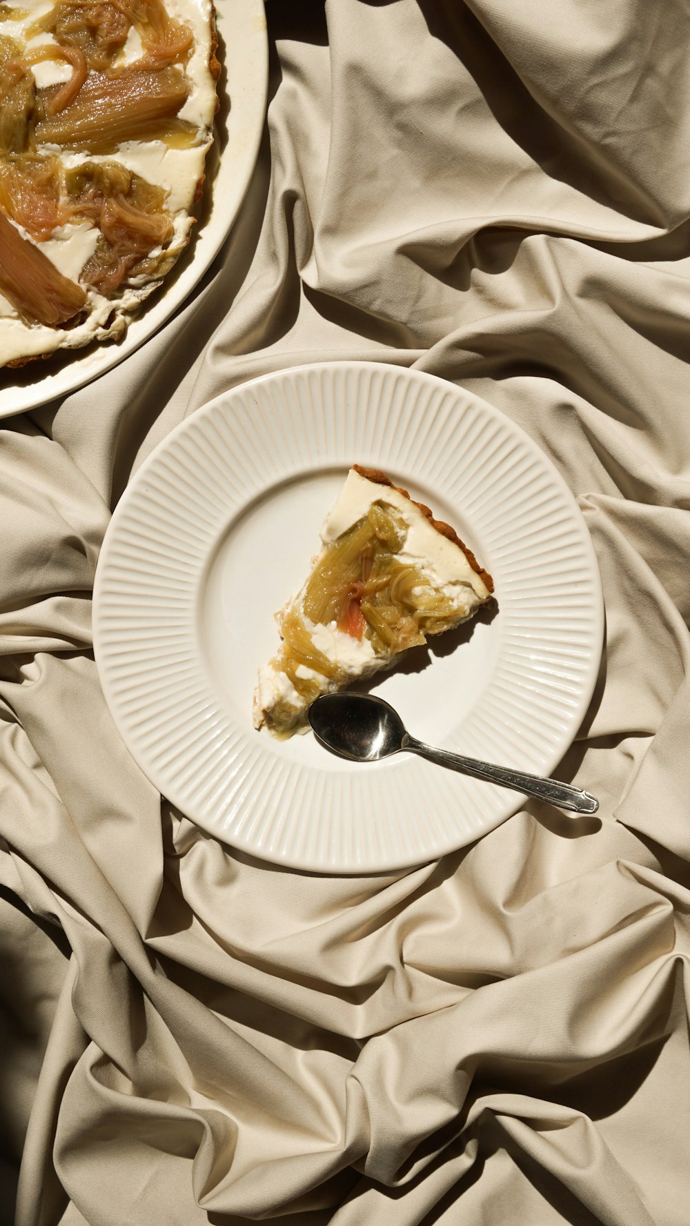 a slice of pie on a plate with a fork