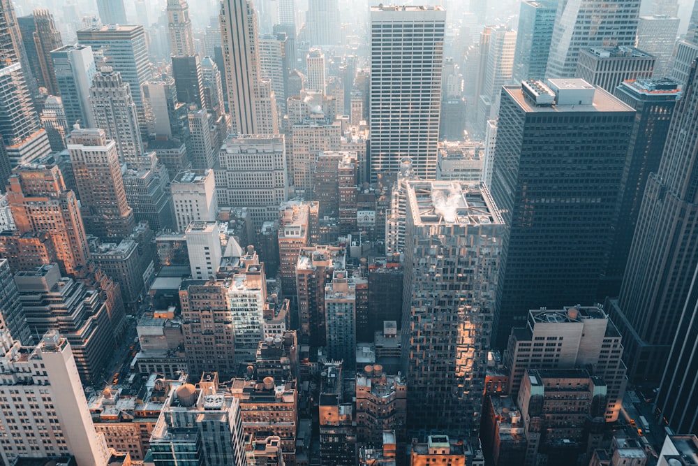 an aerial view of a city with tall buildings