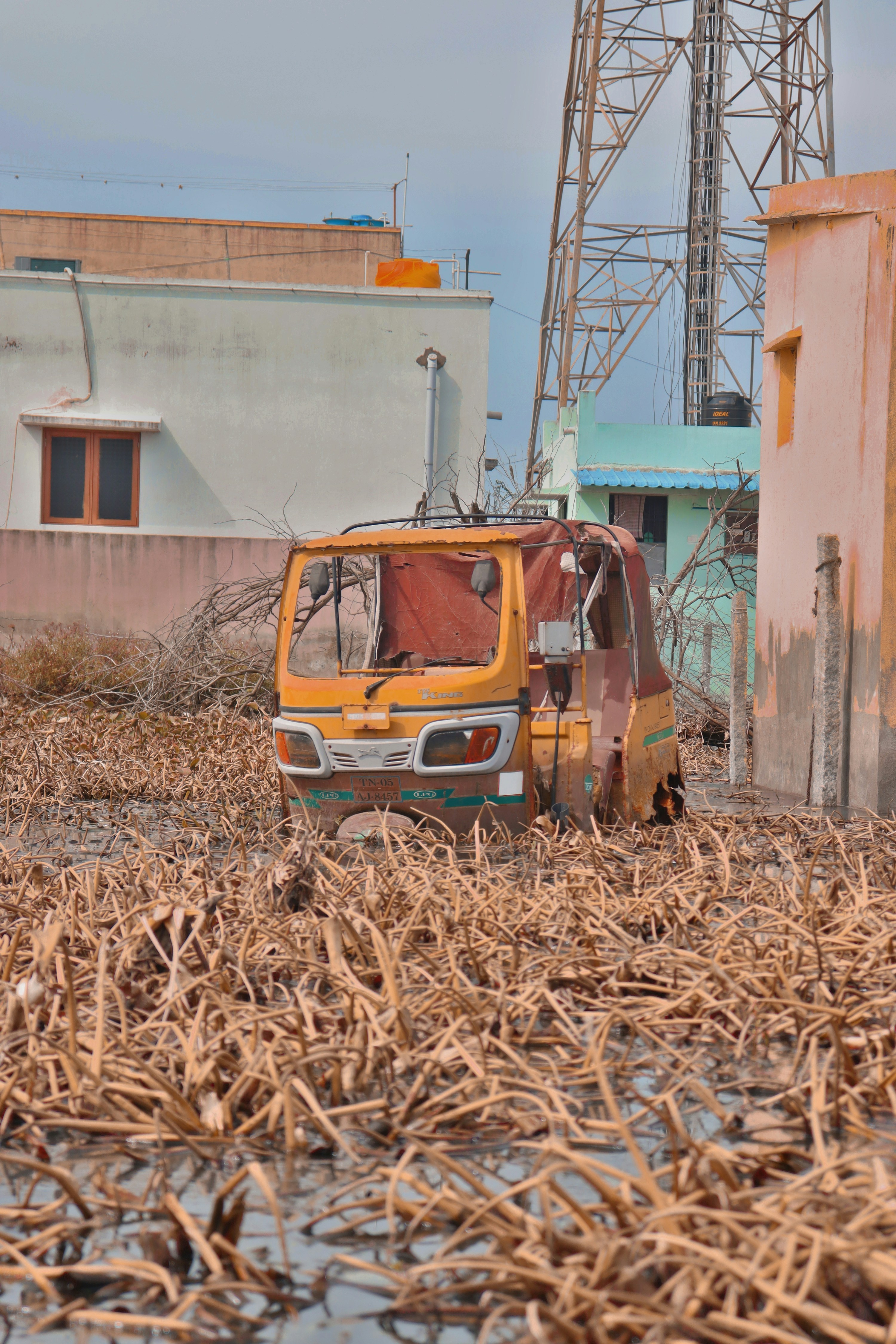 a truck parked in a field of dead grass