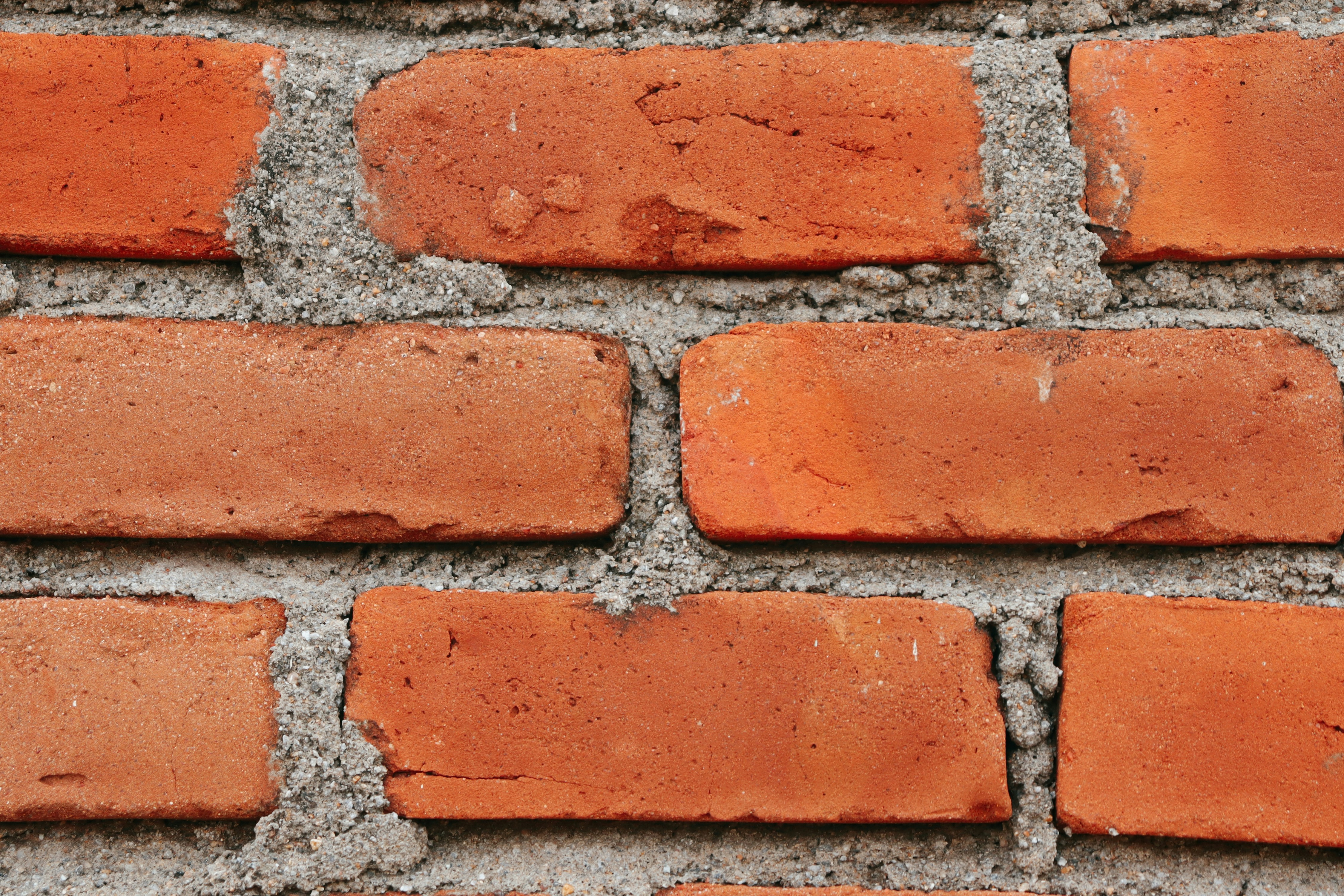 a close up of a brick wall made of bricks