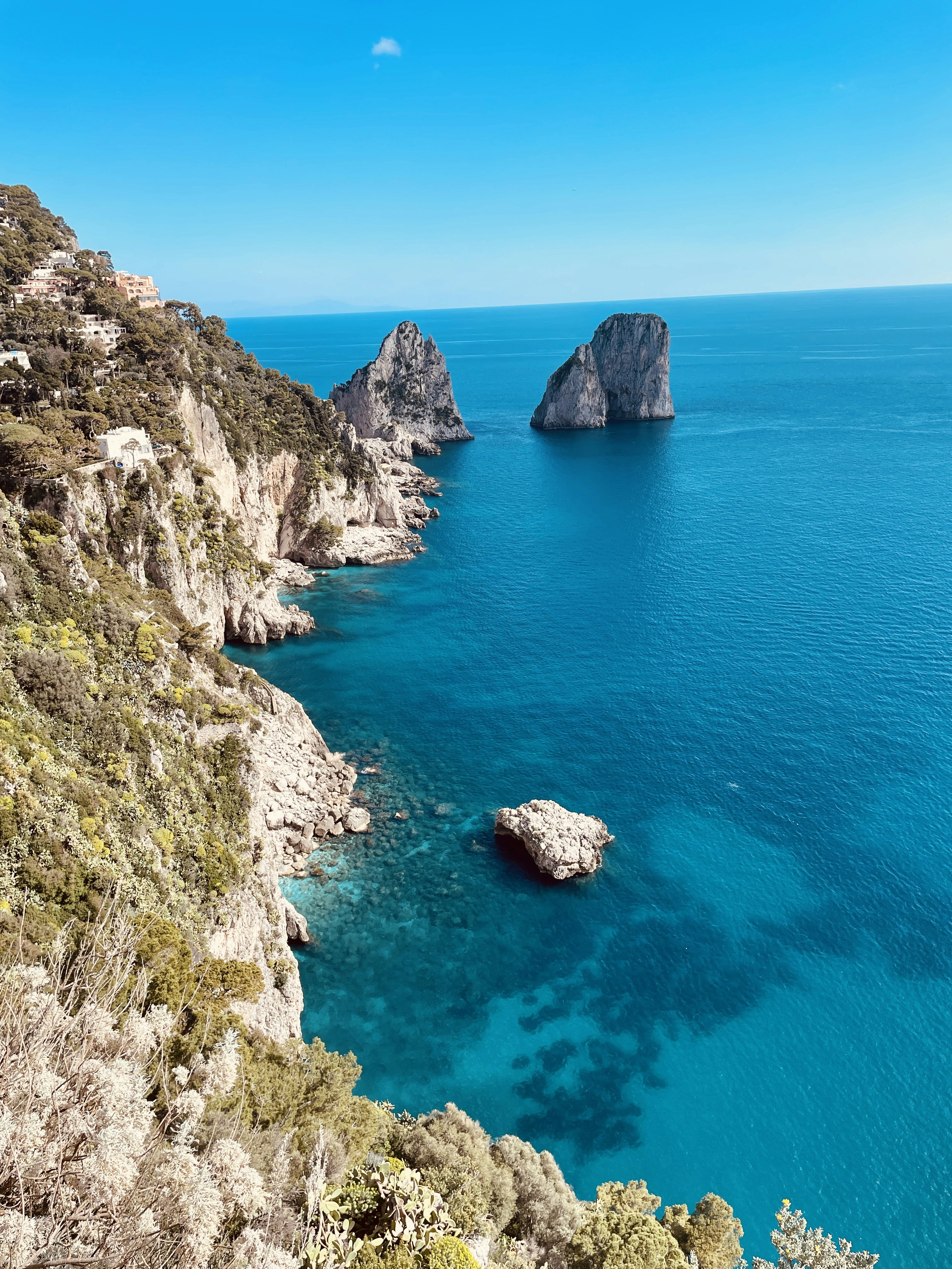 a view of a body of water from a hill