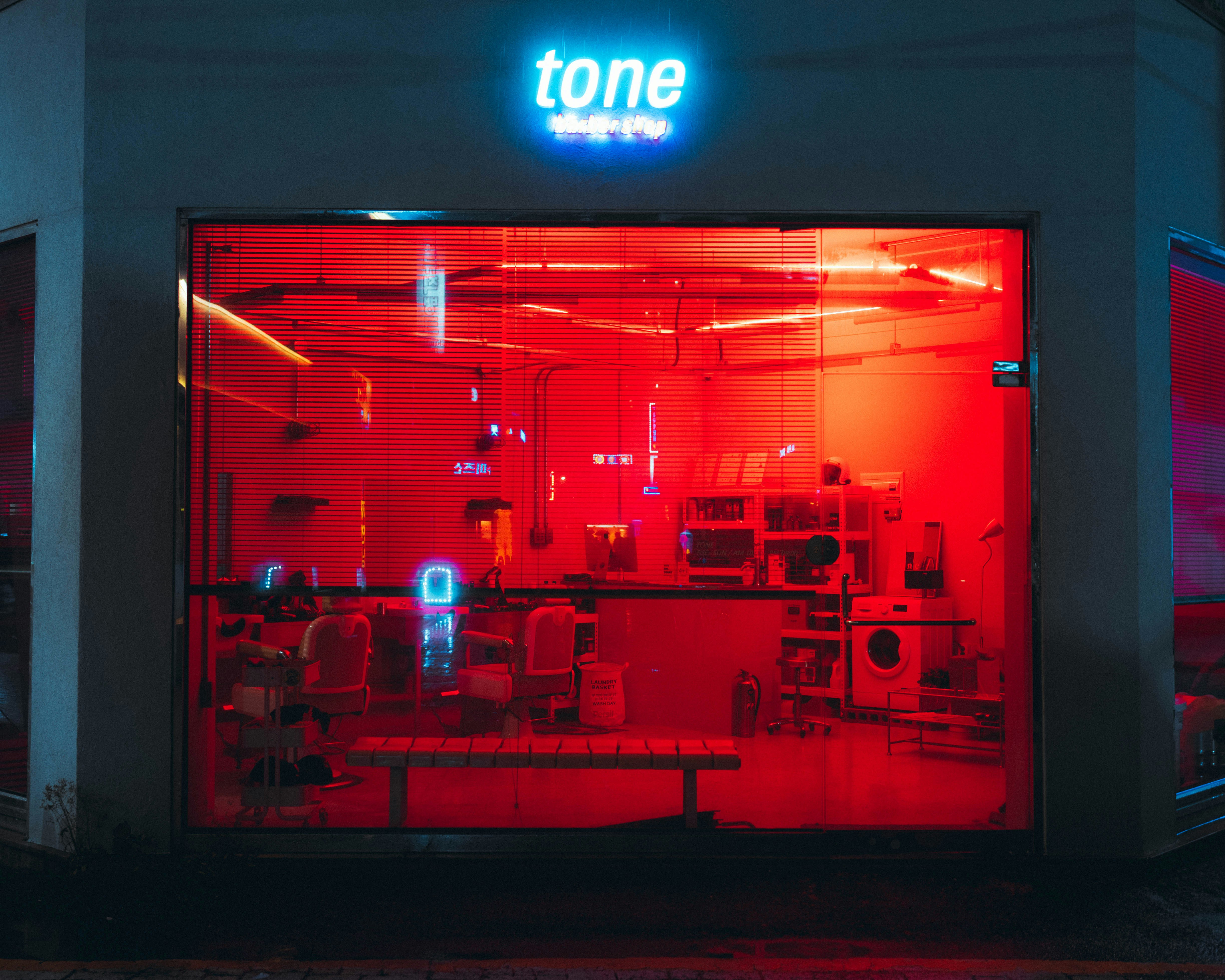 A building with a red light inside of it photo Free Image on Unsplash