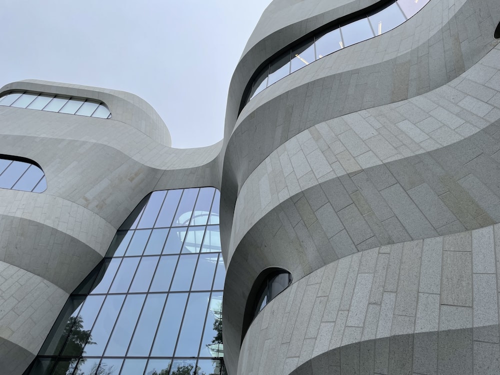 a couple of windows that are on the side of a building